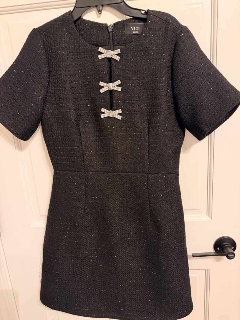 VICI Black Tweed Mini Dress with Rhinestone Bow Accents

Never been worn